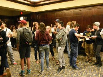 SAC students, faculty, family, and friends gather in the Michigan Theater lobby for a pre-screening reception to celebrate the premieres of Andrew Day's and Joe Biglin's films, NIGHT WATCH and FEBRUARY 14, 1992.